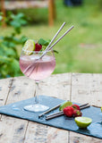 Stainless steel drinking straws in a cocktail